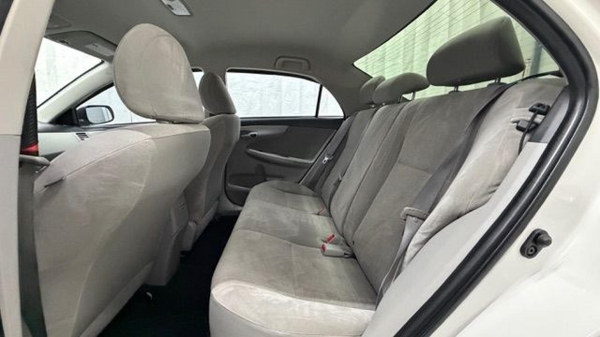 2013 White Toyota Corolla LE 4-Speed AT (JTDBU4EE4DJ) with an 1.8L L4 DOHC 16V engine, 4-Speed Automatic transmission, located at 1806 Veterans Memorial Hwy SW, Austell, GA, 30168, (770) 944-9558, 33.817959, -84.606987- Photo#14