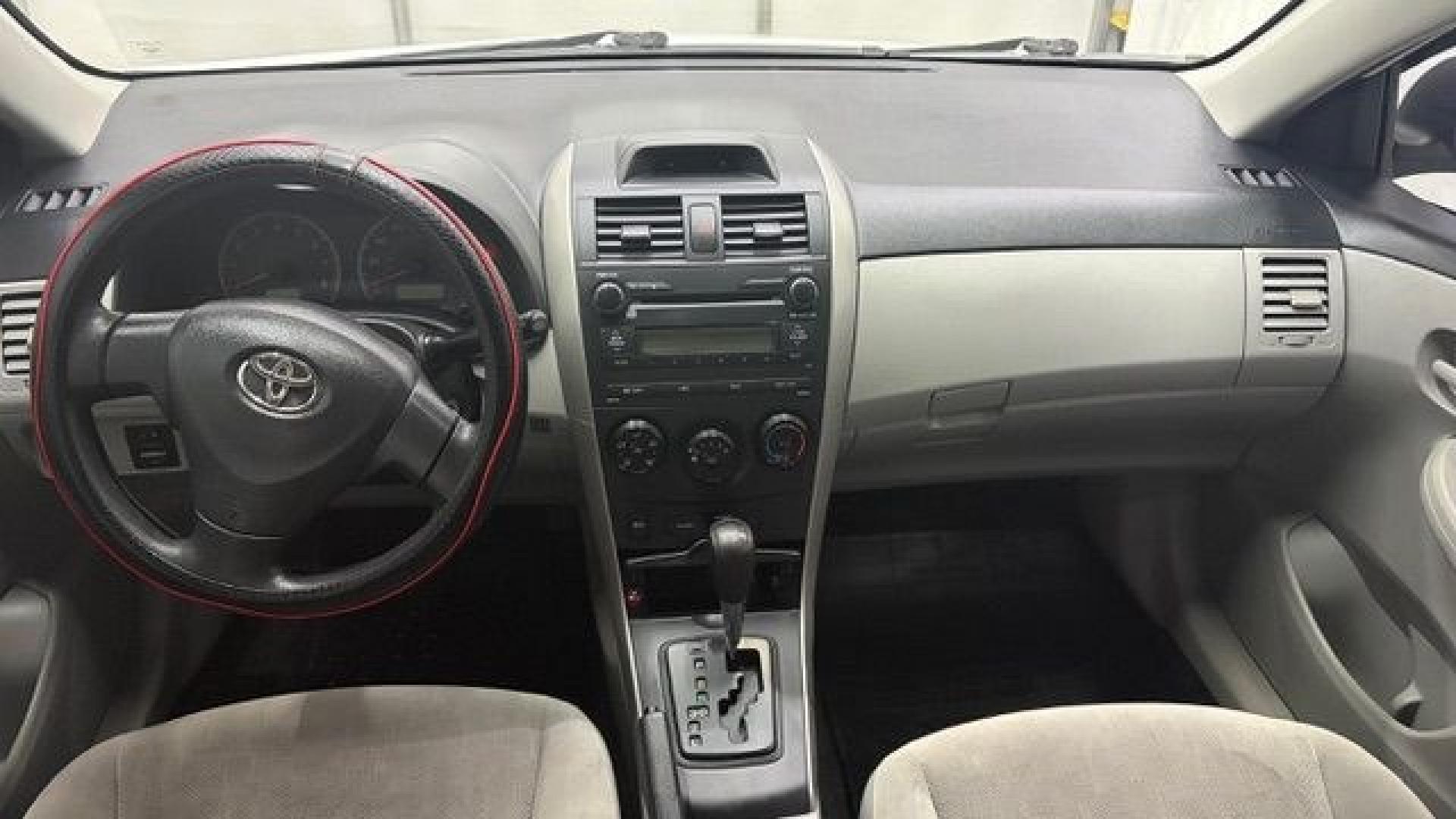 2013 White Toyota Corolla LE 4-Speed AT (JTDBU4EE4DJ) with an 1.8L L4 DOHC 16V engine, 4-Speed Automatic transmission, located at 1806 Veterans Memorial Hwy SW, Austell, GA, 30168, (770) 944-9558, 33.817959, -84.606987- Photo#15