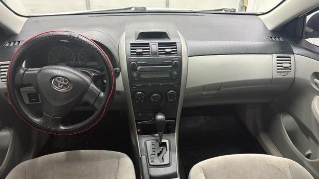 2013 White Toyota Corolla LE 4-Speed AT (JTDBU4EE4DJ) with an 1.8L L4 DOHC 16V engine, 4-Speed Automatic transmission, located at 1806 Veterans Memorial Hwy SW, Austell, GA, 30168, (770) 944-9558, 33.817959, -84.606987 - Photo#15