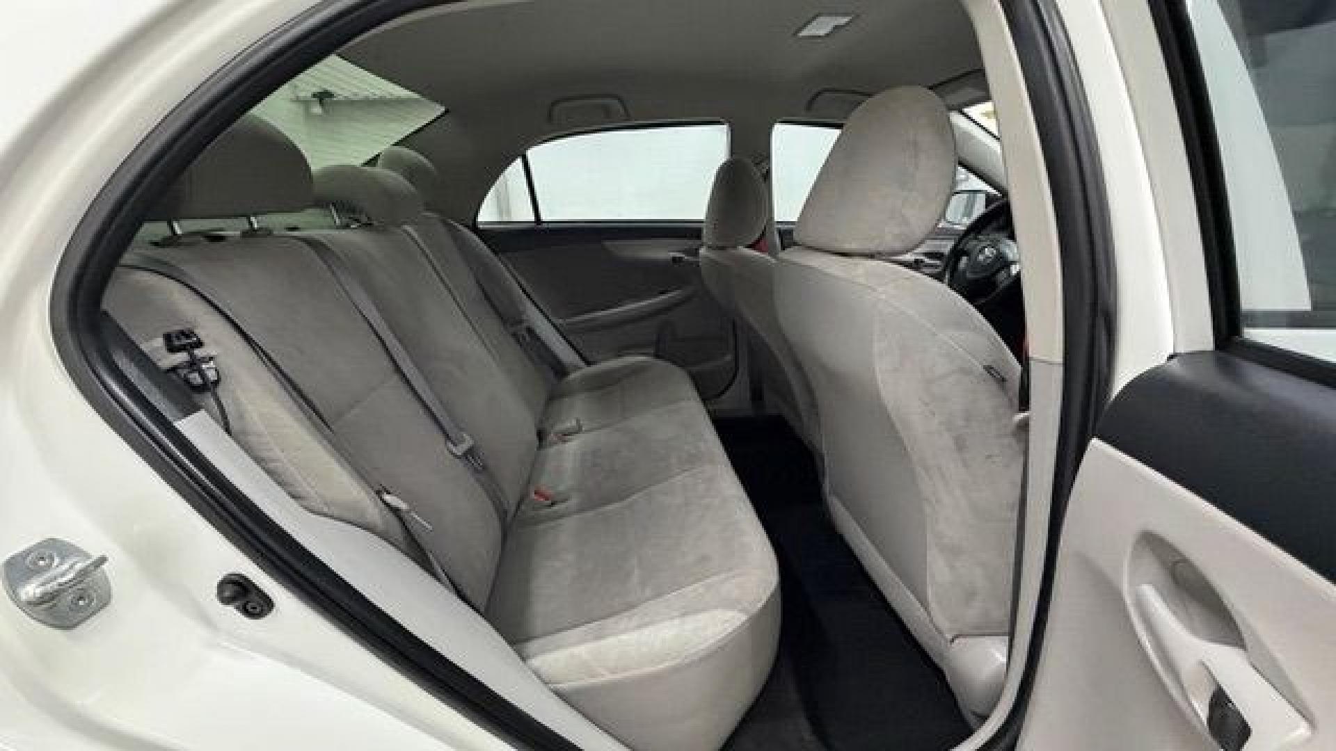 2013 White Toyota Corolla LE 4-Speed AT (JTDBU4EE4DJ) with an 1.8L L4 DOHC 16V engine, 4-Speed Automatic transmission, located at 1806 Veterans Memorial Hwy SW, Austell, GA, 30168, (770) 944-9558, 33.817959, -84.606987- Photo#16