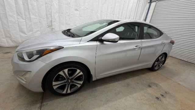 2014 Silver Hyundai Elantra GLS A/T (KMHDH4AHXEU) with an 2.0L L4 DOHC 16V engine, 6-Speed Automatic transmission, located at 1806 Veterans Memorial Hwy SW, Austell, GA, 30168, (770) 944-9558, 33.817959, -84.606987 - Photo#1
