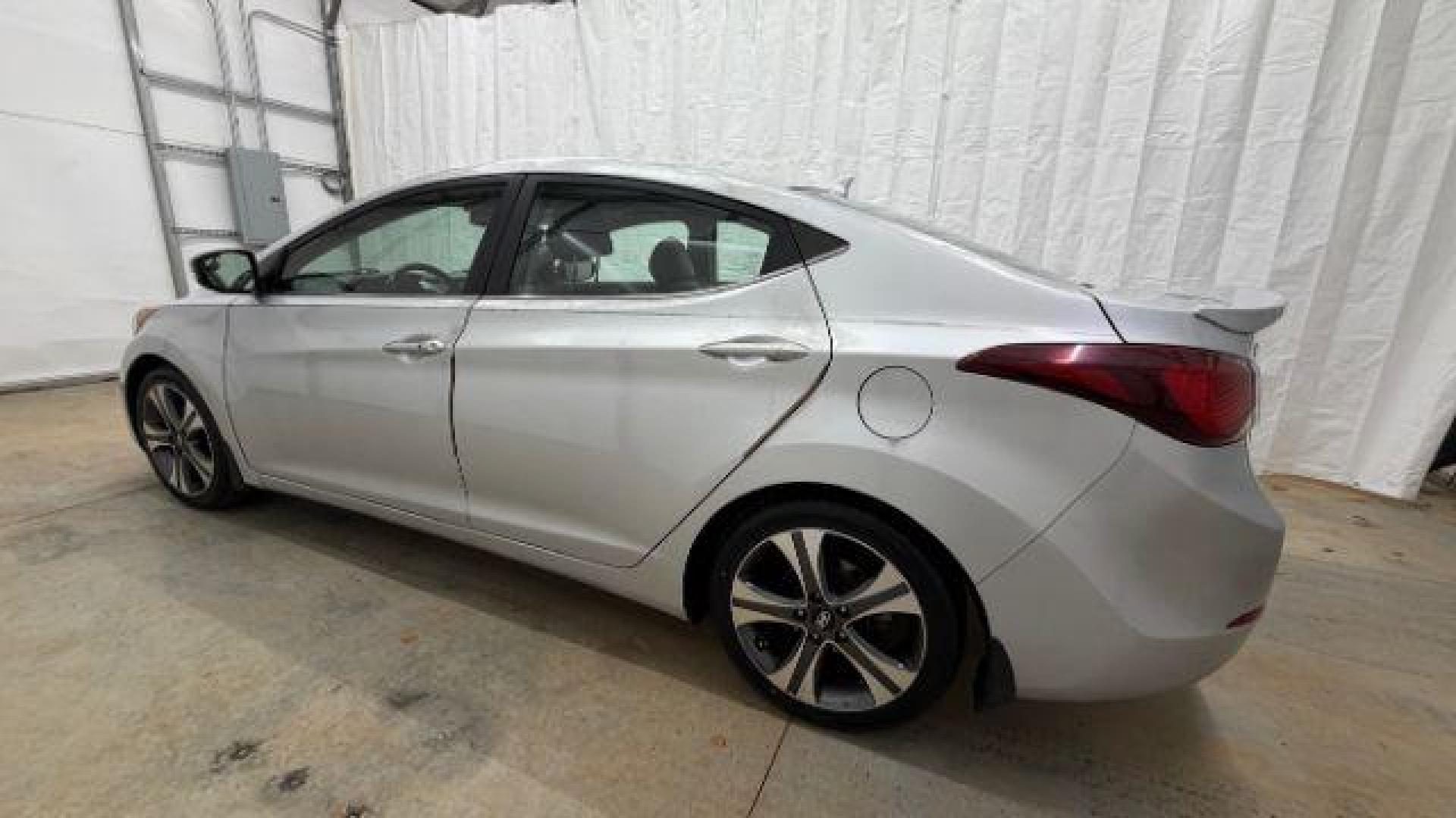 2014 Silver Hyundai Elantra GLS A/T (KMHDH4AHXEU) with an 2.0L L4 DOHC 16V engine, 6-Speed Automatic transmission, located at 1806 Veterans Memorial Hwy SW, Austell, GA, 30168, (770) 944-9558, 33.817959, -84.606987 - Photo#2