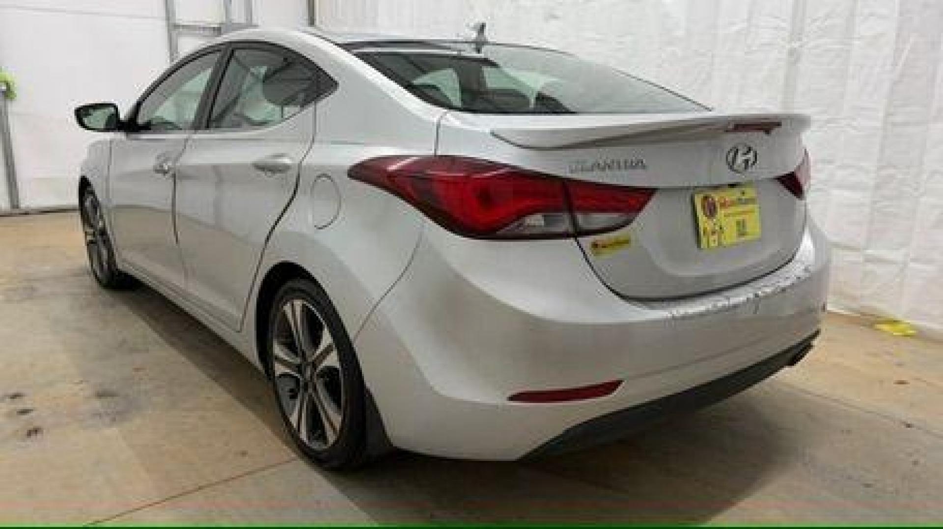 2014 Silver Hyundai Elantra GLS A/T (KMHDH4AHXEU) with an 2.0L L4 DOHC 16V engine, 6-Speed Automatic transmission, located at 1806 Veterans Memorial Hwy SW, Austell, GA, 30168, (770) 944-9558, 33.817959, -84.606987 - Photo#3