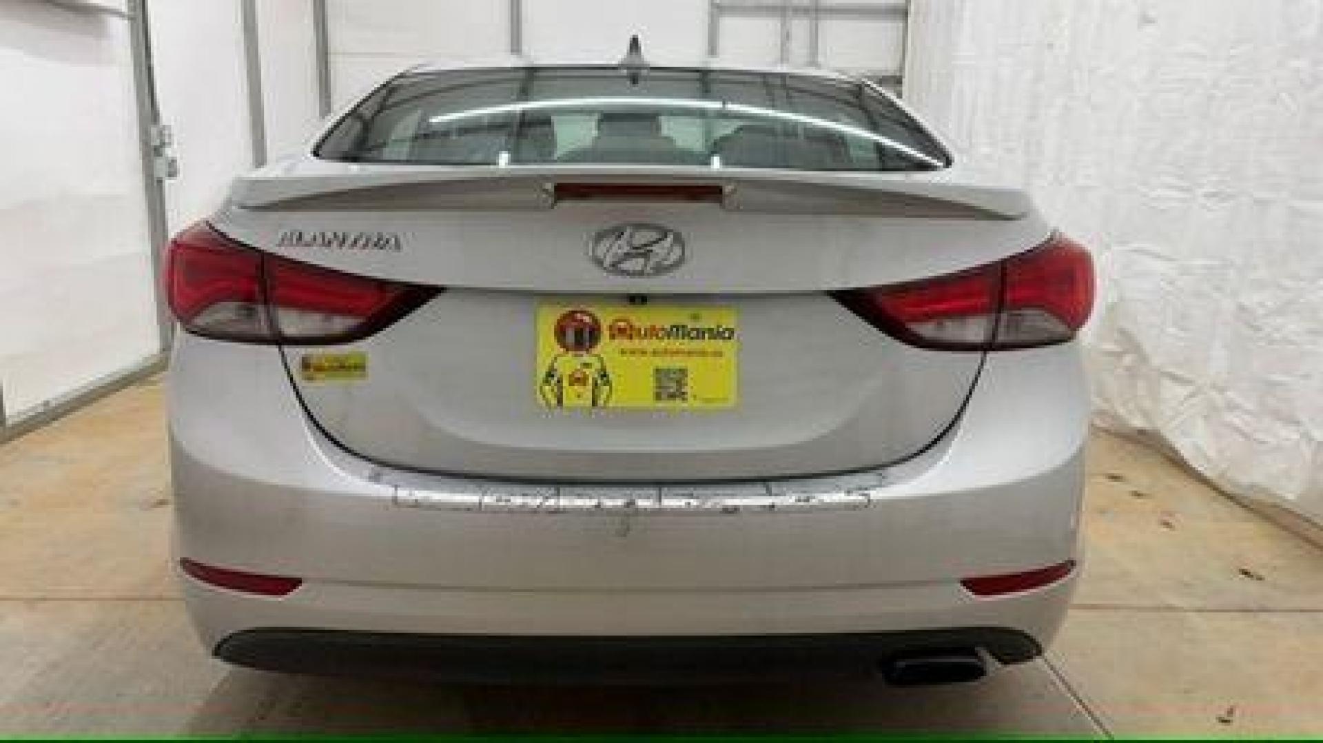 2014 Silver Hyundai Elantra GLS A/T (KMHDH4AHXEU) with an 2.0L L4 DOHC 16V engine, 6-Speed Automatic transmission, located at 1806 Veterans Memorial Hwy SW, Austell, GA, 30168, (770) 944-9558, 33.817959, -84.606987 - Photo#4