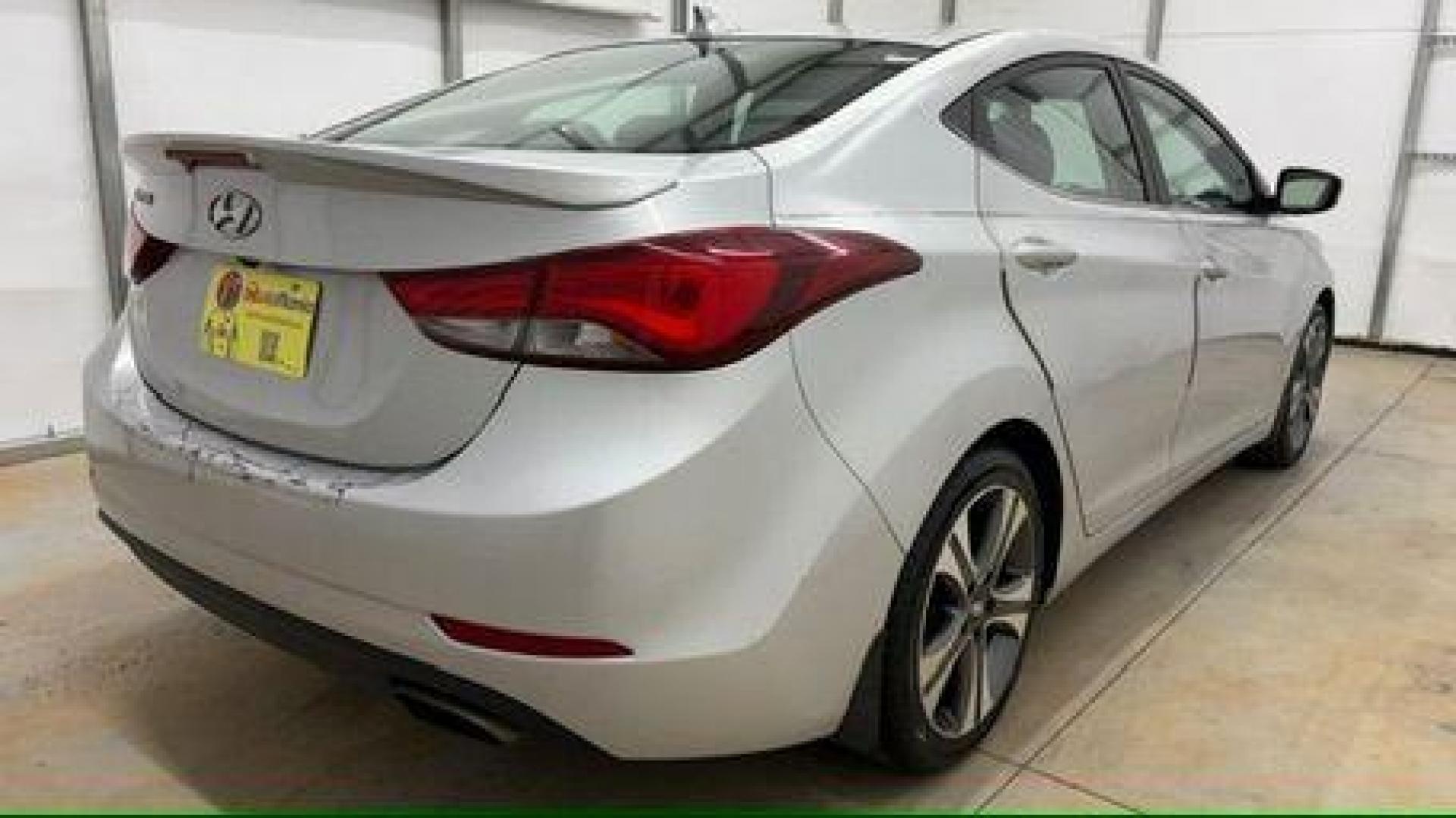 2014 Silver Hyundai Elantra GLS A/T (KMHDH4AHXEU) with an 2.0L L4 DOHC 16V engine, 6-Speed Automatic transmission, located at 1806 Veterans Memorial Hwy SW, Austell, GA, 30168, (770) 944-9558, 33.817959, -84.606987 - Photo#5