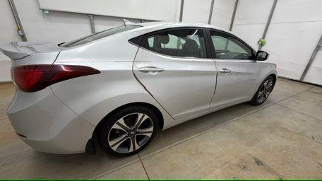 2014 Silver Hyundai Elantra GLS A/T (KMHDH4AHXEU) with an 2.0L L4 DOHC 16V engine, 6-Speed Automatic transmission, located at 1806 Veterans Memorial Hwy SW, Austell, GA, 30168, (770) 944-9558, 33.817959, -84.606987 - Photo#6
