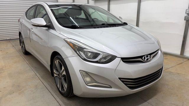 2014 Silver Hyundai Elantra GLS A/T (KMHDH4AHXEU) with an 2.0L L4 DOHC 16V engine, 6-Speed Automatic transmission, located at 1806 Veterans Memorial Hwy SW, Austell, GA, 30168, (770) 944-9558, 33.817959, -84.606987 - Photo#8