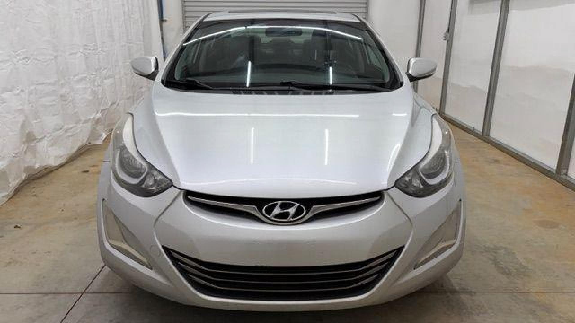 2014 Silver Hyundai Elantra GLS A/T (KMHDH4AHXEU) with an 2.0L L4 DOHC 16V engine, 6-Speed Automatic transmission, located at 1806 Veterans Memorial Hwy SW, Austell, GA, 30168, (770) 944-9558, 33.817959, -84.606987 - Photo#9