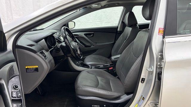 2014 Silver Hyundai Elantra GLS A/T (KMHDH4AHXEU) with an 2.0L L4 DOHC 16V engine, 6-Speed Automatic transmission, located at 1806 Veterans Memorial Hwy SW, Austell, GA, 30168, (770) 944-9558, 33.817959, -84.606987 - Photo#11