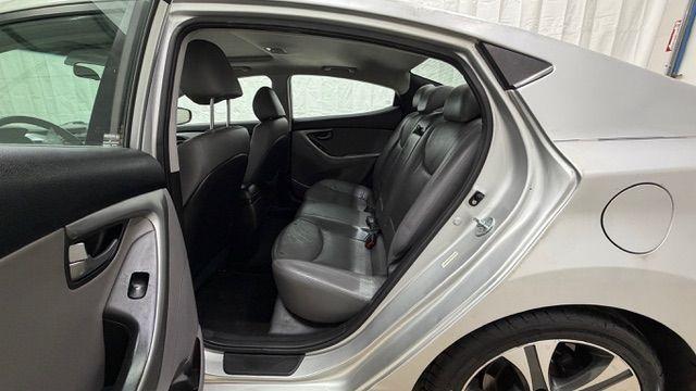 2014 Silver Hyundai Elantra GLS A/T (KMHDH4AHXEU) with an 2.0L L4 DOHC 16V engine, 6-Speed Automatic transmission, located at 1806 Veterans Memorial Hwy SW, Austell, GA, 30168, (770) 944-9558, 33.817959, -84.606987 - Photo#14