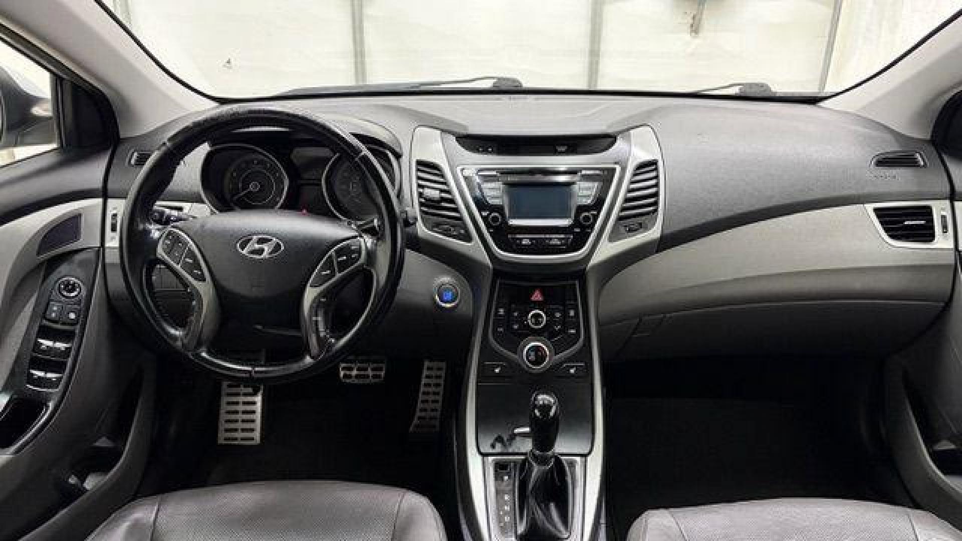 2014 Silver Hyundai Elantra GLS A/T (KMHDH4AHXEU) with an 2.0L L4 DOHC 16V engine, 6-Speed Automatic transmission, located at 1806 Veterans Memorial Hwy SW, Austell, GA, 30168, (770) 944-9558, 33.817959, -84.606987 - Photo#15