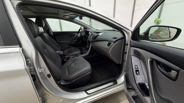 2014 Silver Hyundai Elantra GLS A/T (KMHDH4AHXEU) with an 2.0L L4 DOHC 16V engine, 6-Speed Automatic transmission, located at 1806 Veterans Memorial Hwy SW, Austell, GA, 30168, (770) 944-9558, 33.817959, -84.606987 - Photo#17
