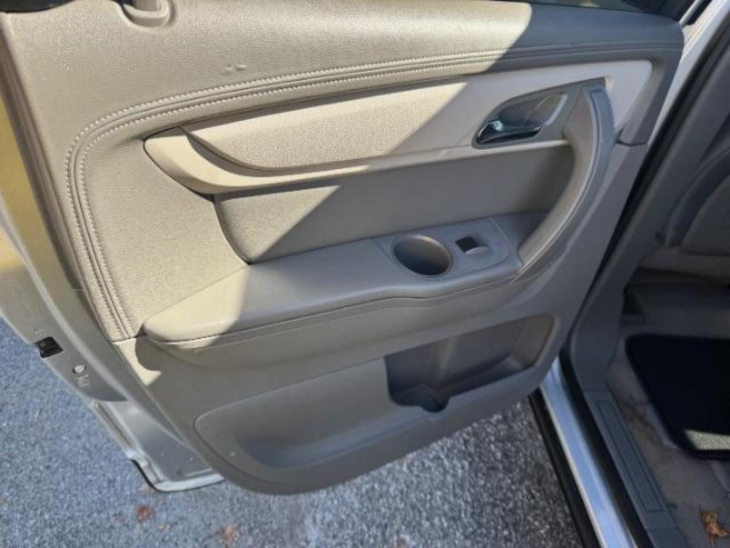 2016 Silver Chevrolet Traverse LS FWD w/PDC (1GNKRFED9GJ) with an 3.6L V6 DOHC 24V engine, 6-Speed Automatic transmission, located at 1806 Veterans Memorial Hwy SW, Austell, GA, 30168, (770) 944-9558, 33.817959, -84.606987 - Photo#10