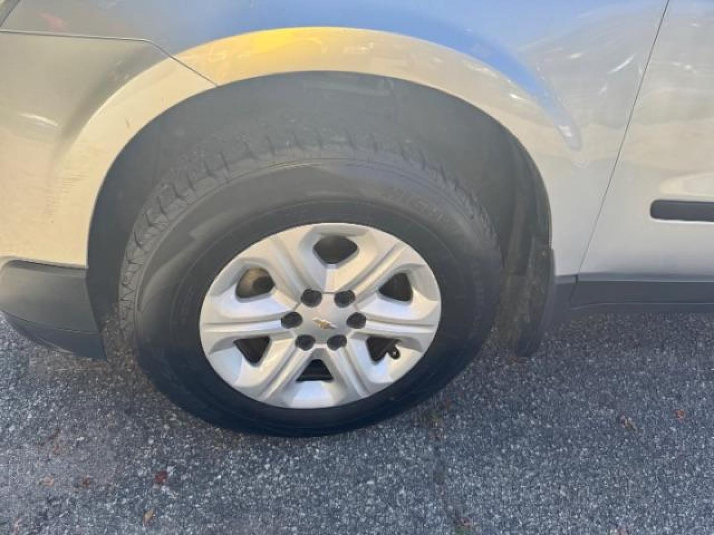 2016 Silver Chevrolet Traverse LS FWD w/PDC (1GNKRFED9GJ) with an 3.6L V6 DOHC 24V engine, 6-Speed Automatic transmission, located at 1806 Veterans Memorial Hwy SW, Austell, GA, 30168, (770) 944-9558, 33.817959, -84.606987 - Photo#19