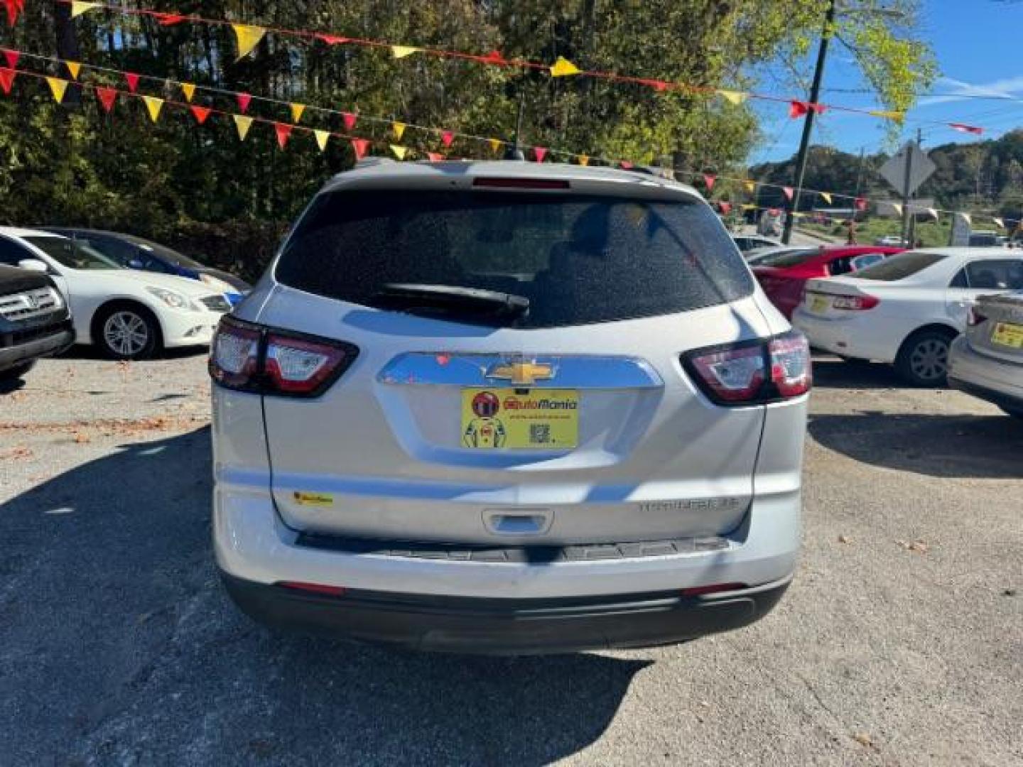 2016 Silver Chevrolet Traverse LS FWD w/PDC (1GNKRFED9GJ) with an 3.6L V6 DOHC 24V engine, 6-Speed Automatic transmission, located at 1806 Veterans Memorial Hwy SW, Austell, GA, 30168, (770) 944-9558, 33.817959, -84.606987 - Photo#2