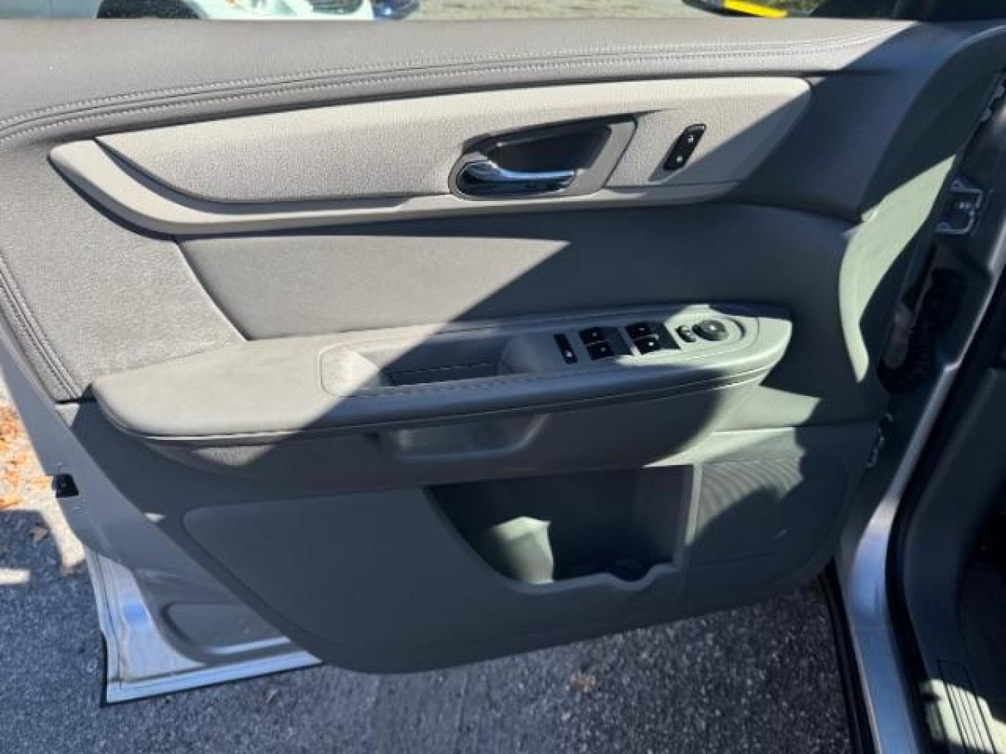 2016 Silver Chevrolet Traverse LS FWD w/PDC (1GNKRFED9GJ) with an 3.6L V6 DOHC 24V engine, 6-Speed Automatic transmission, located at 1806 Veterans Memorial Hwy SW, Austell, GA, 30168, (770) 944-9558, 33.817959, -84.606987 - Photo#6