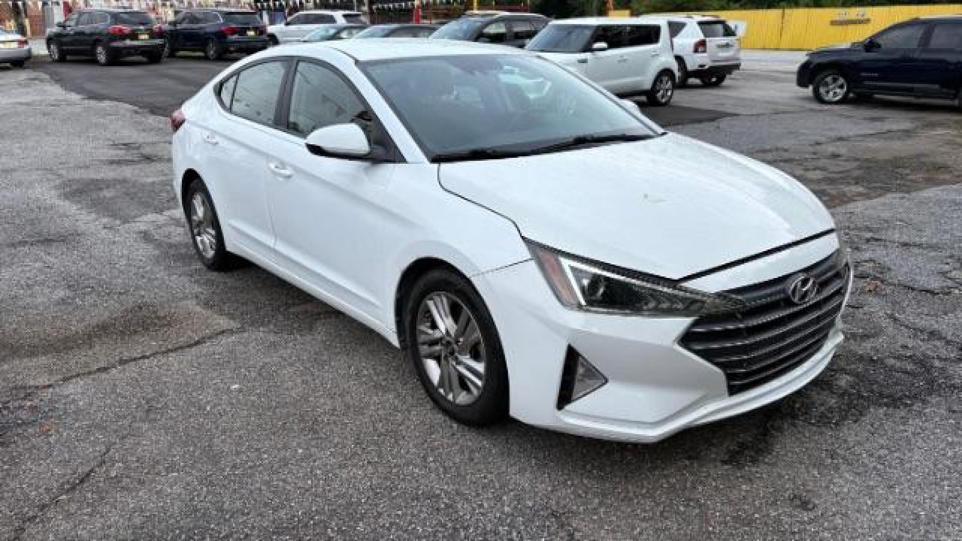 2019 White Hyundai Elantra Limited (5NPD84LF6KH) with an 1.8L L4 DOHC 16V engine, 6-Speed Automatic transmission, located at 1806 Veterans Memorial Hwy SW, Austell, GA, 30168, (770) 944-9558, 33.817959, -84.606987 - Photo#2