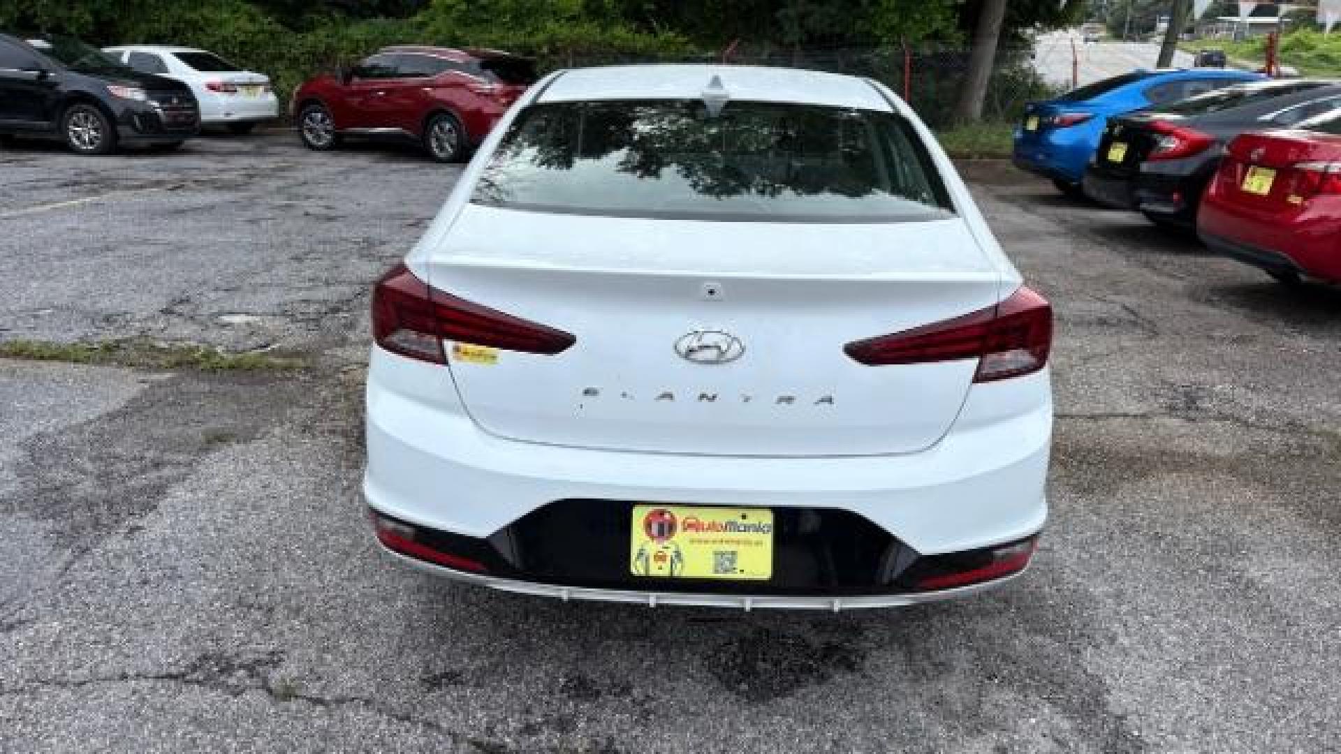 2019 White Hyundai Elantra Limited (5NPD84LF6KH) with an 1.8L L4 DOHC 16V engine, 6-Speed Automatic transmission, located at 1806 Veterans Memorial Hwy SW, Austell, GA, 30168, (770) 944-9558, 33.817959, -84.606987 - Photo#4