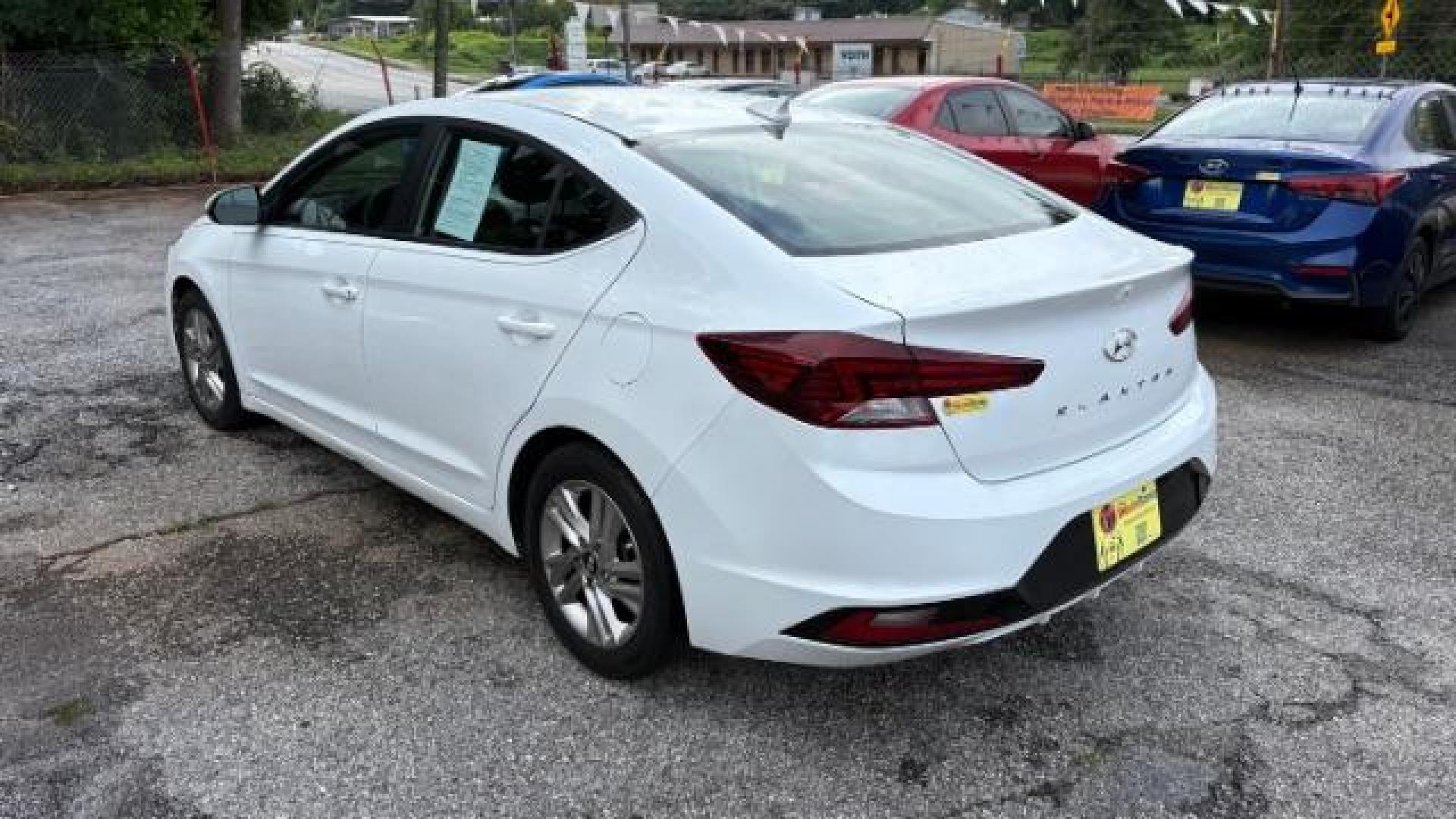 2019 White Hyundai Elantra Limited (5NPD84LF6KH) with an 1.8L L4 DOHC 16V engine, 6-Speed Automatic transmission, located at 1806 Veterans Memorial Hwy SW, Austell, GA, 30168, (770) 944-9558, 33.817959, -84.606987 - Photo#5