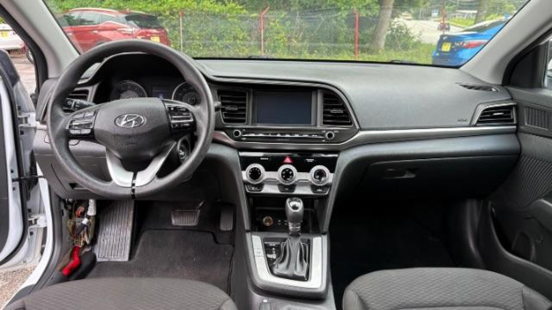 2019 White Hyundai Elantra Limited (5NPD84LF6KH) with an 1.8L L4 DOHC 16V engine, 6-Speed Automatic transmission, located at 1806 Veterans Memorial Hwy SW, Austell, GA, 30168, (770) 944-9558, 33.817959, -84.606987 - Photo#6