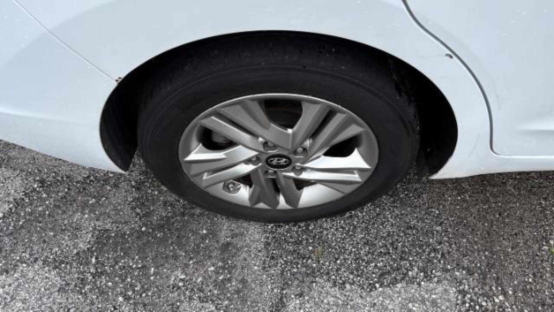 2019 White Hyundai Elantra Limited (5NPD84LF6KH) with an 1.8L L4 DOHC 16V engine, 6-Speed Automatic transmission, located at 1806 Veterans Memorial Hwy SW, Austell, GA, 30168, (770) 944-9558, 33.817959, -84.606987 - Photo#14