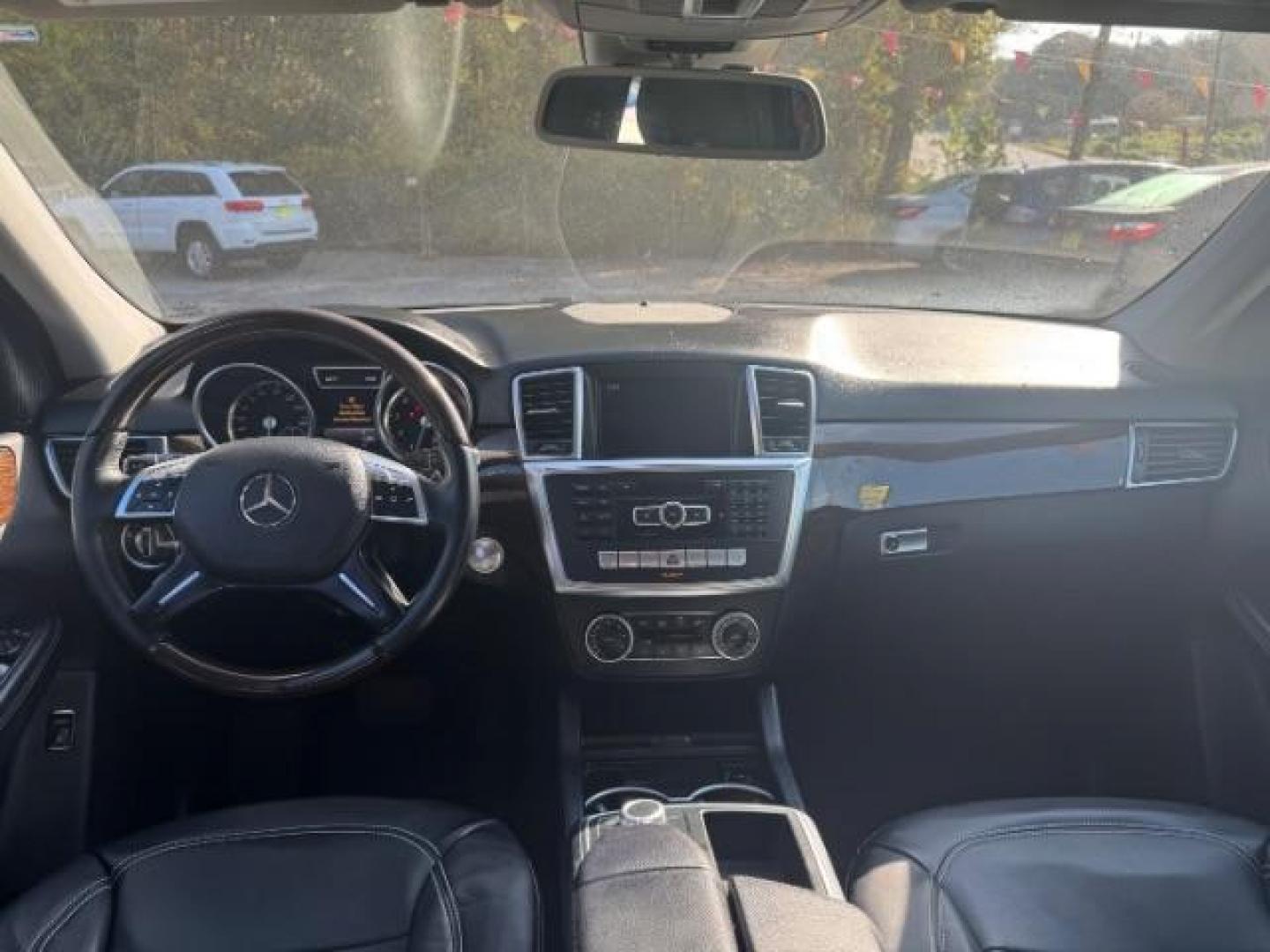 2014 Black Mercedes-Benz M-Class ML350 (4JGDA5JB5EA) with an 3.5L V6 DOHC 24V engine, 7-Speed Automatic transmission, located at 1806 Veterans Memorial Hwy SW, Austell, GA, 30168, (770) 944-9558, 33.817959, -84.606987 - Photo#10