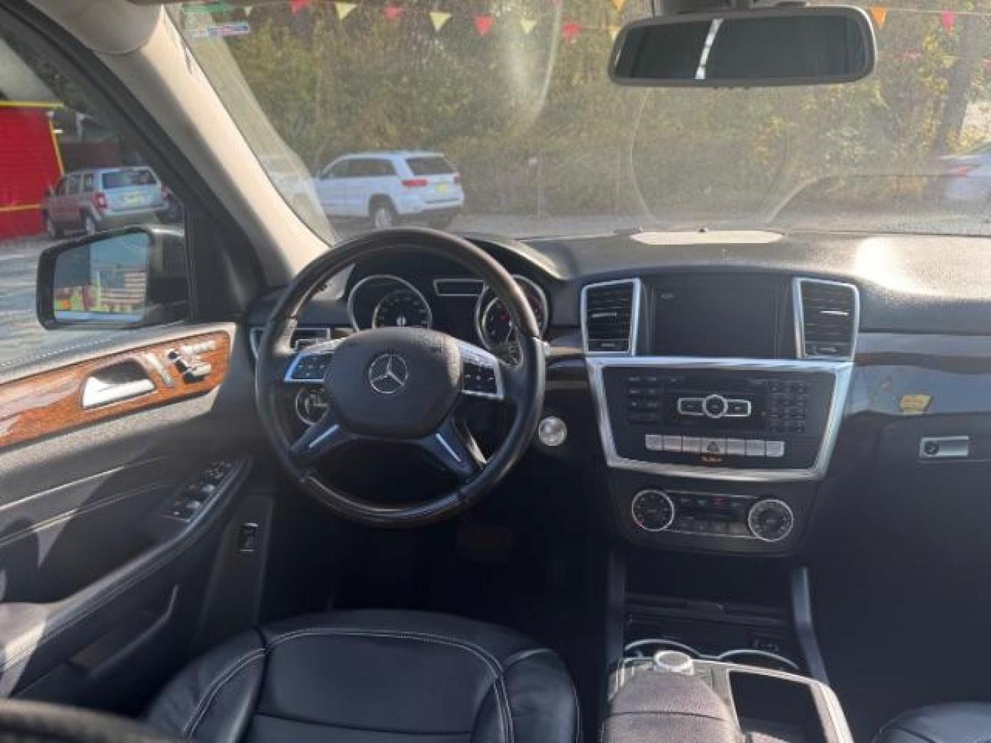 2014 Black Mercedes-Benz M-Class ML350 (4JGDA5JB5EA) with an 3.5L V6 DOHC 24V engine, 7-Speed Automatic transmission, located at 1806 Veterans Memorial Hwy SW, Austell, GA, 30168, (770) 944-9558, 33.817959, -84.606987 - Photo#11