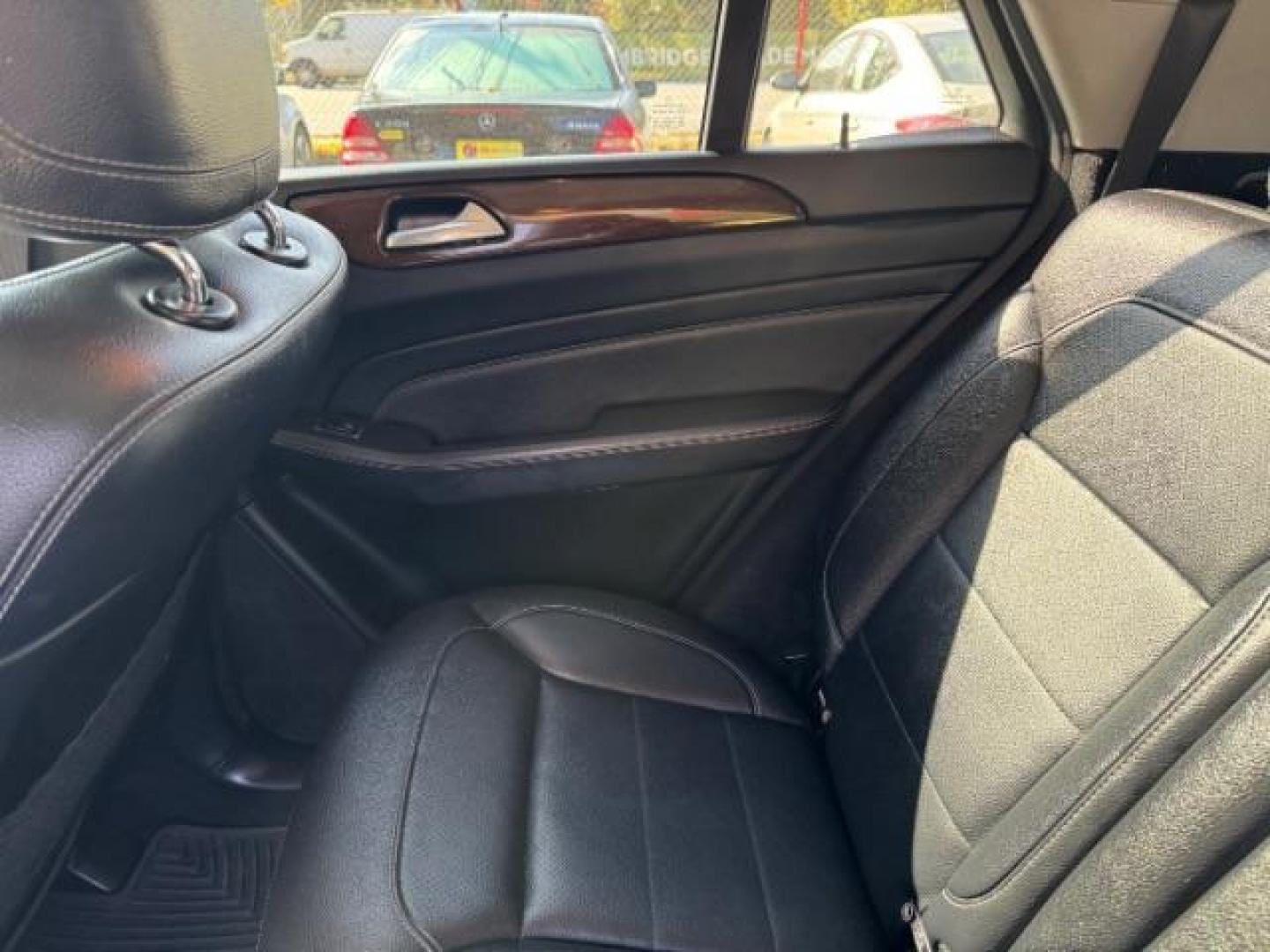 2014 Black Mercedes-Benz M-Class ML350 (4JGDA5JB5EA) with an 3.5L V6 DOHC 24V engine, 7-Speed Automatic transmission, located at 1806 Veterans Memorial Hwy SW, Austell, GA, 30168, (770) 944-9558, 33.817959, -84.606987 - Photo#12