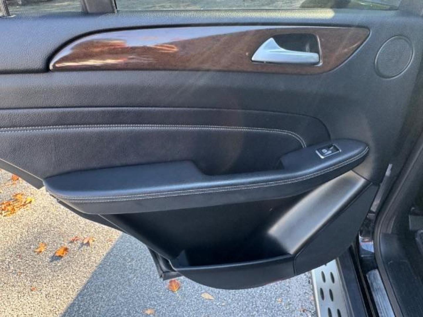 2014 Black Mercedes-Benz M-Class ML350 (4JGDA5JB5EA) with an 3.5L V6 DOHC 24V engine, 7-Speed Automatic transmission, located at 1806 Veterans Memorial Hwy SW, Austell, GA, 30168, (770) 944-9558, 33.817959, -84.606987 - Photo#13