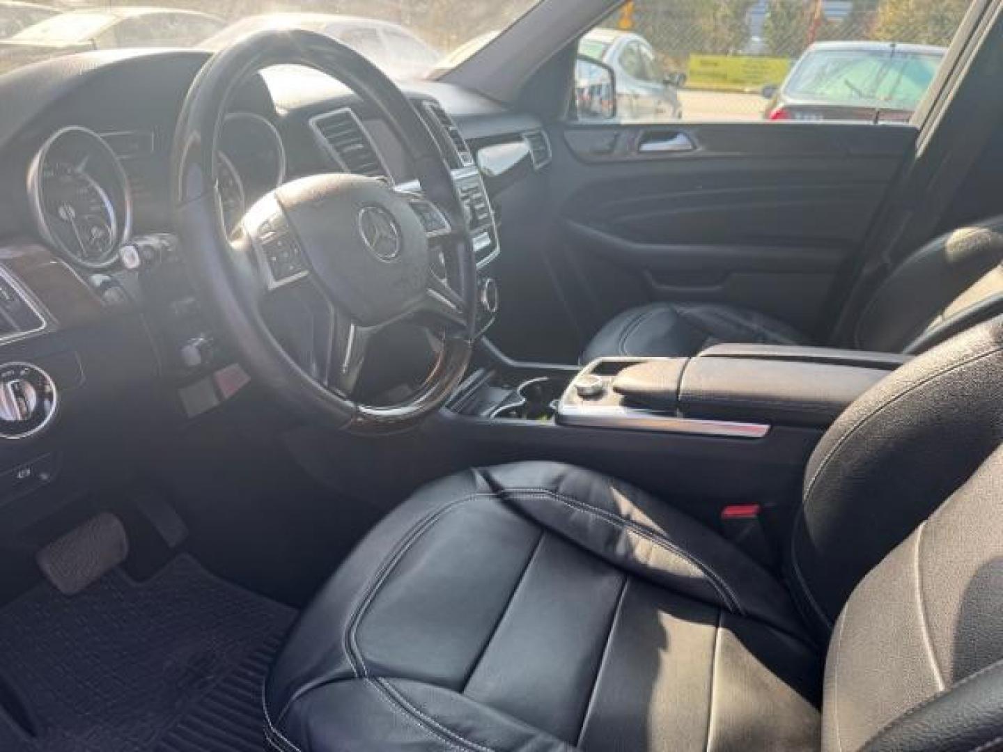 2014 Black Mercedes-Benz M-Class ML350 (4JGDA5JB5EA) with an 3.5L V6 DOHC 24V engine, 7-Speed Automatic transmission, located at 1806 Veterans Memorial Hwy SW, Austell, GA, 30168, (770) 944-9558, 33.817959, -84.606987 - Photo#16