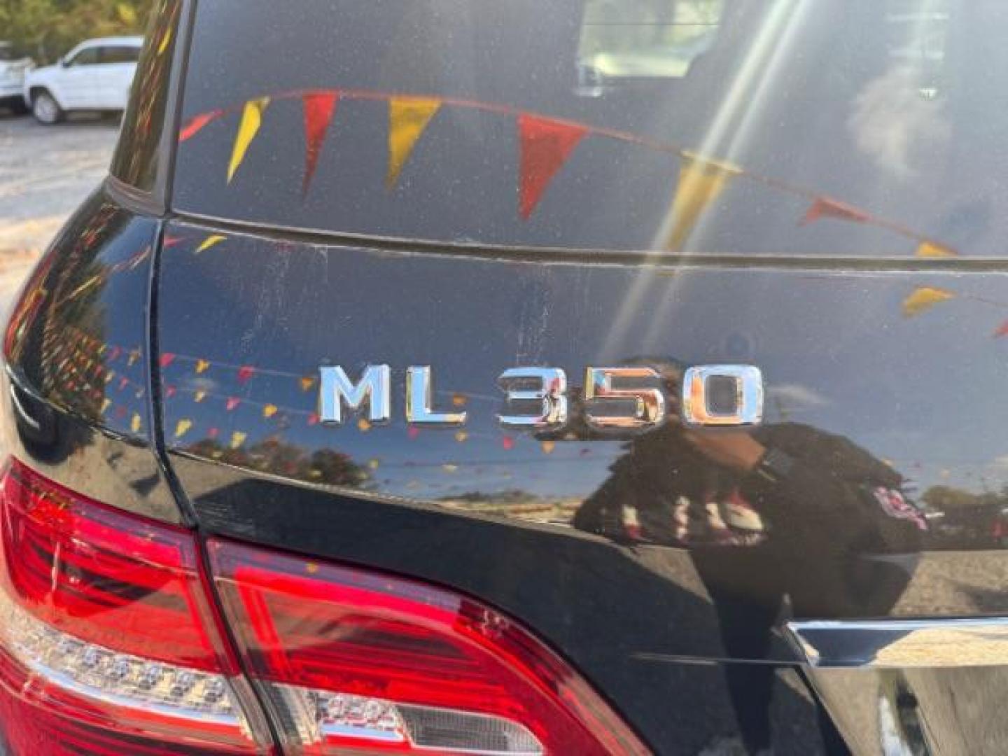2014 Black Mercedes-Benz M-Class ML350 (4JGDA5JB5EA) with an 3.5L V6 DOHC 24V engine, 7-Speed Automatic transmission, located at 1806 Veterans Memorial Hwy SW, Austell, GA, 30168, (770) 944-9558, 33.817959, -84.606987 - Photo#21