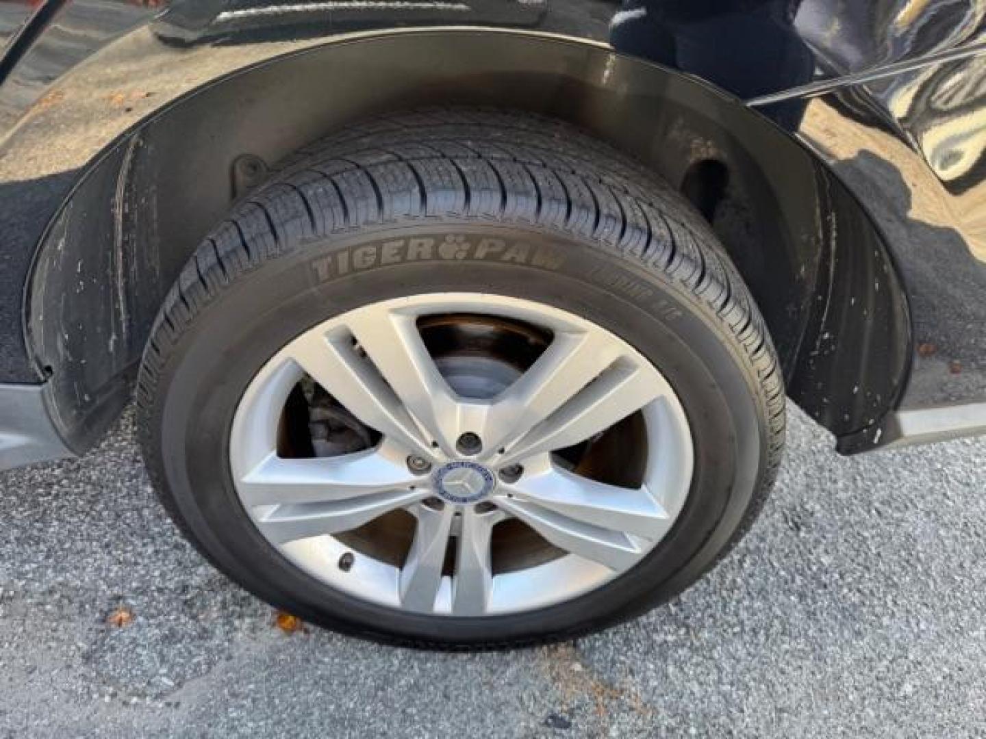 2014 Black Mercedes-Benz M-Class ML350 (4JGDA5JB5EA) with an 3.5L V6 DOHC 24V engine, 7-Speed Automatic transmission, located at 1806 Veterans Memorial Hwy SW, Austell, GA, 30168, (770) 944-9558, 33.817959, -84.606987 - Photo#23