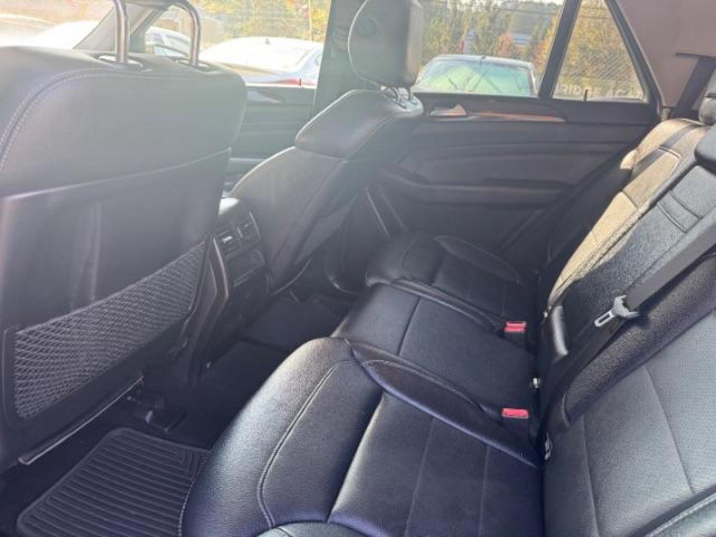 2014 Black Mercedes-Benz M-Class ML350 (4JGDA5JB5EA) with an 3.5L V6 DOHC 24V engine, 7-Speed Automatic transmission, located at 1806 Veterans Memorial Hwy SW, Austell, GA, 30168, (770) 944-9558, 33.817959, -84.606987 - Photo#8