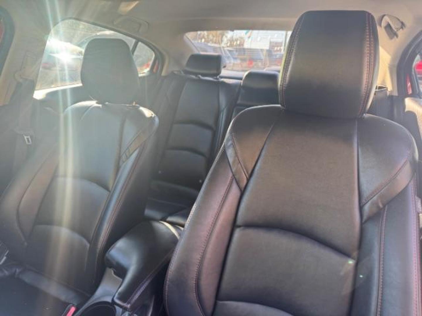 2015 Red Mazda MAZDA3 i Grand Touring AT 4-Door (3MZBM1W76FM) with an 2.0L L4 DOHC 16V engine, 6-Speed Automatic transmission, located at 1806 Veterans Memorial Hwy SW, Austell, GA, 30168, (770) 944-9558, 33.817959, -84.606987 - Photo#8