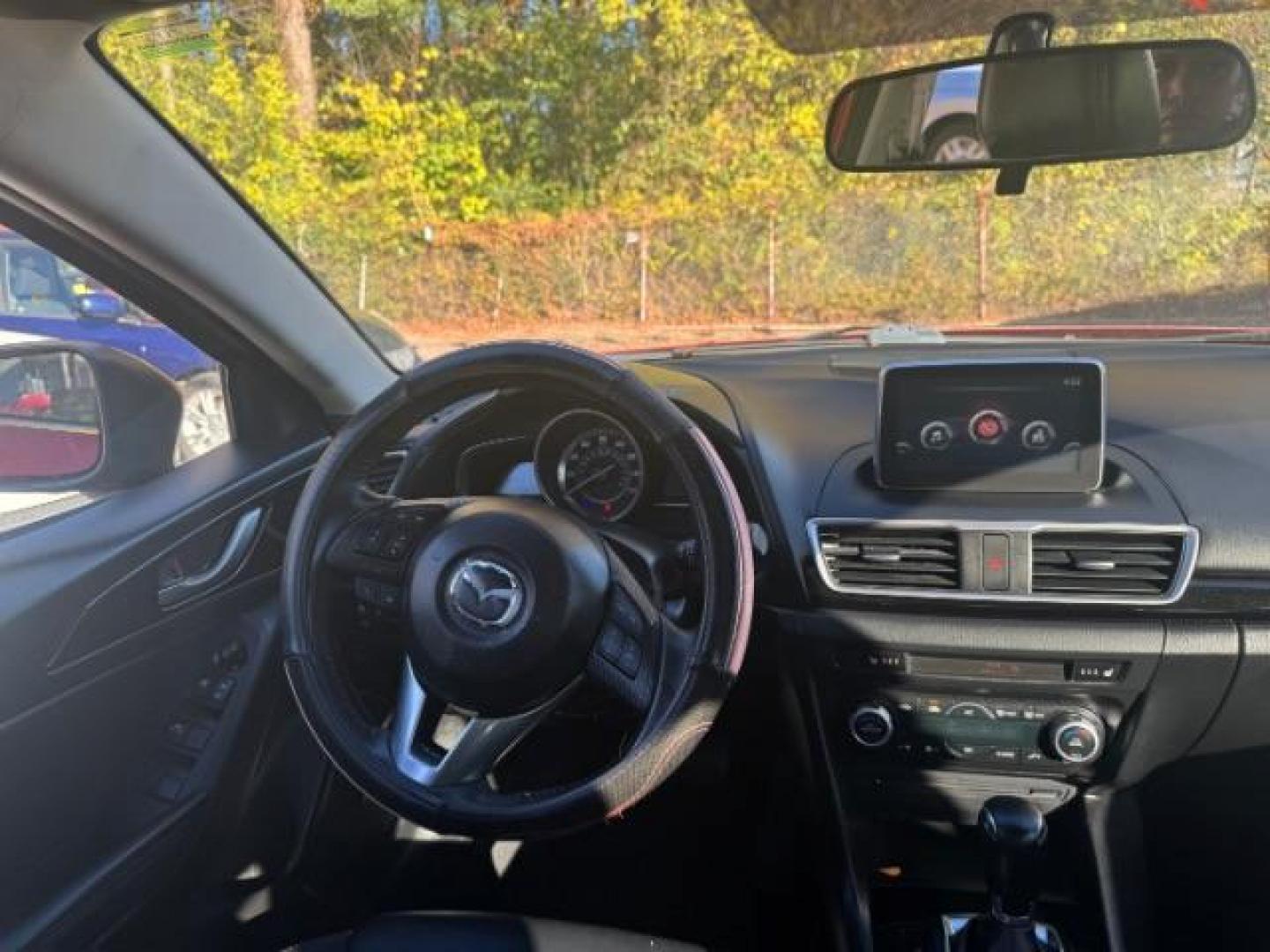 2015 Red Mazda MAZDA3 i Grand Touring AT 4-Door (3MZBM1W76FM) with an 2.0L L4 DOHC 16V engine, 6-Speed Automatic transmission, located at 1806 Veterans Memorial Hwy SW, Austell, GA, 30168, (770) 944-9558, 33.817959, -84.606987 - Photo#10