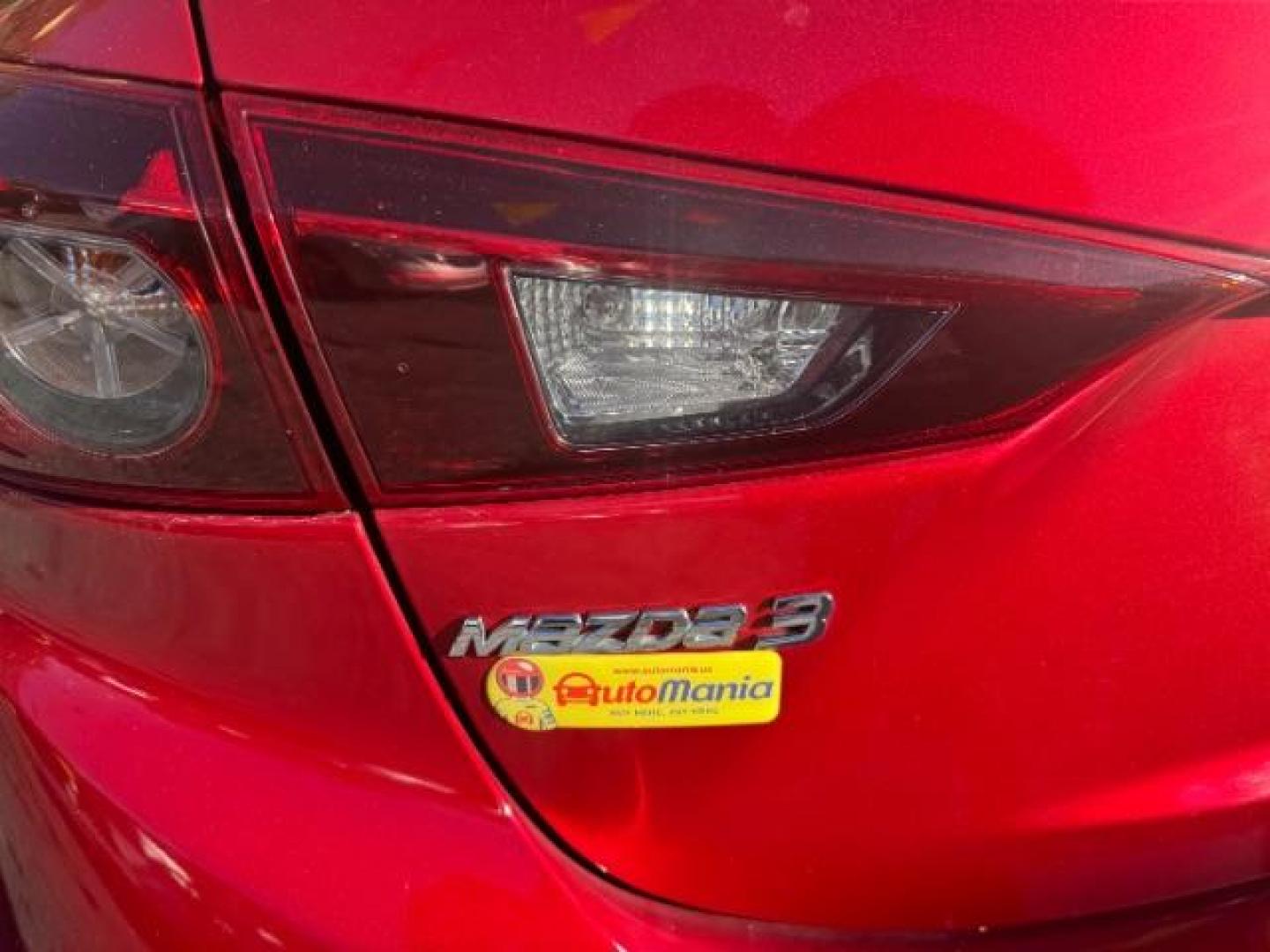 2015 Red Mazda MAZDA3 i Grand Touring AT 4-Door (3MZBM1W76FM) with an 2.0L L4 DOHC 16V engine, 6-Speed Automatic transmission, located at 1806 Veterans Memorial Hwy SW, Austell, GA, 30168, (770) 944-9558, 33.817959, -84.606987 - Photo#13