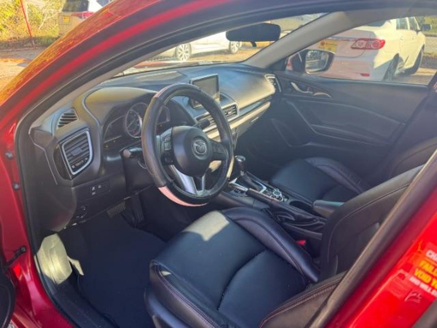2015 Red Mazda MAZDA3 i Grand Touring AT 4-Door (3MZBM1W76FM) with an 2.0L L4 DOHC 16V engine, 6-Speed Automatic transmission, located at 1806 Veterans Memorial Hwy SW, Austell, GA, 30168, (770) 944-9558, 33.817959, -84.606987 - Photo#5