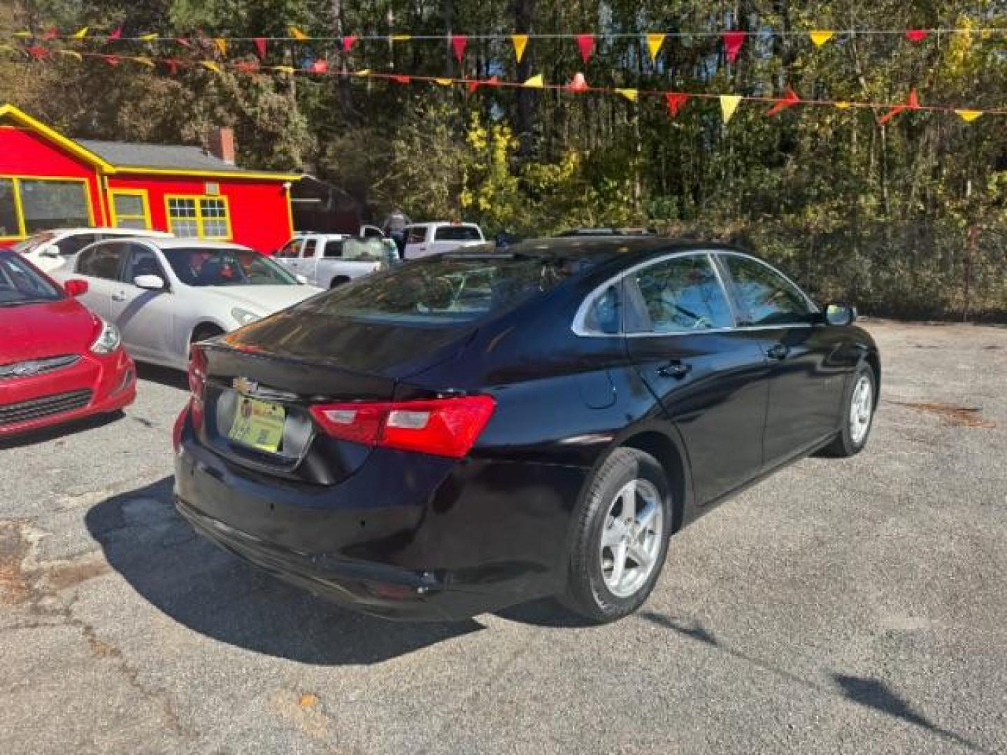 2017 Black Chevrolet Malibu LS (1G1ZB5ST0HF) with an 1.5L L4 DOHC 16V engine, 6-Speed Automatic transmission, located at 1806 Veterans Memorial Hwy SW, Austell, GA, 30168, (770) 944-9558, 33.817959, -84.606987 - Photo#2