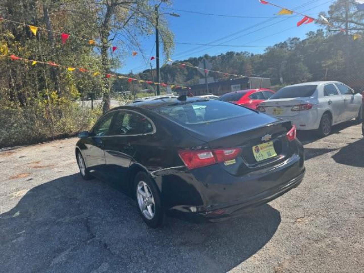 2017 Black Chevrolet Malibu LS (1G1ZB5ST0HF) with an 1.5L L4 DOHC 16V engine, 6-Speed Automatic transmission, located at 1806 Veterans Memorial Hwy SW, Austell, GA, 30168, (770) 944-9558, 33.817959, -84.606987 - Photo#8