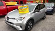 2018 Silver Toyota RAV4 LE FWD (2T3ZFREV3JW) with an 2.5L L4 DOHC 16V engine, 6-Speed Automatic transmission, located at 1806 Veterans Memorial Hwy SW, Austell, GA, 30168, (770) 944-9558, 33.817959, -84.606987 - Photo#0