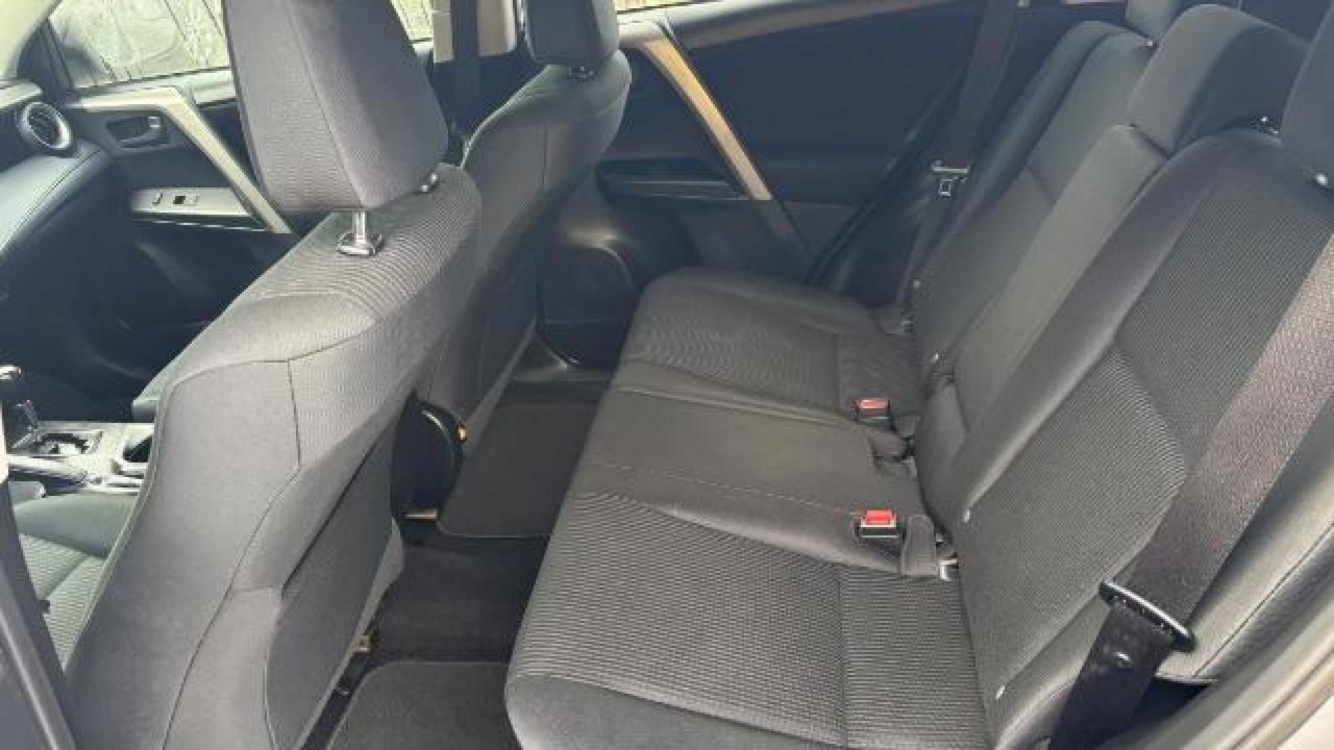 2018 Silver Toyota RAV4 LE FWD (2T3ZFREV3JW) with an 2.5L L4 DOHC 16V engine, 6-Speed Automatic transmission, located at 1806 Veterans Memorial Hwy SW, Austell, GA, 30168, (770) 944-9558, 33.817959, -84.606987 - Photo#8