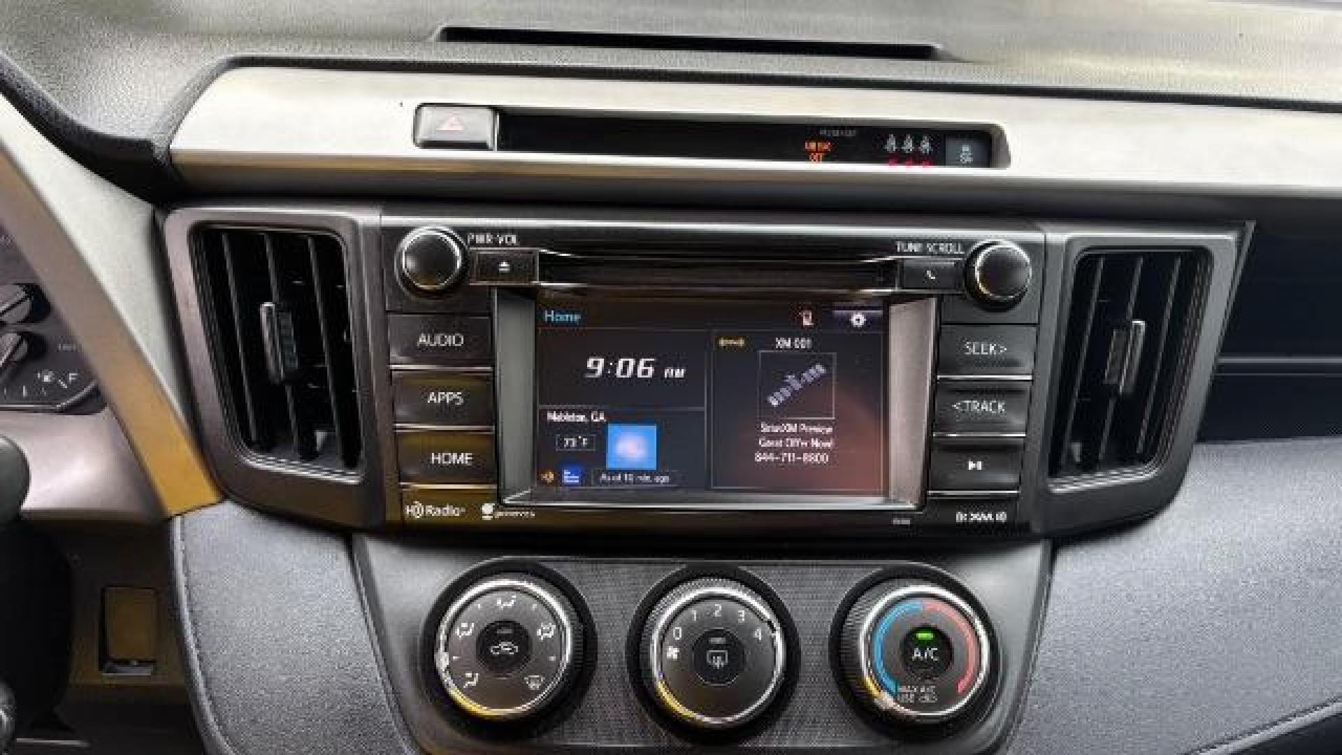2018 Silver Toyota RAV4 LE FWD (2T3ZFREV3JW) with an 2.5L L4 DOHC 16V engine, 6-Speed Automatic transmission, located at 1806 Veterans Memorial Hwy SW, Austell, GA, 30168, (770) 944-9558, 33.817959, -84.606987 - Photo#15