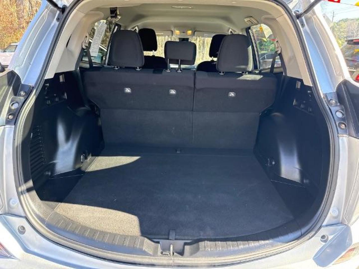 2018 Silver Toyota RAV4 LE FWD (2T3ZFREV3JW) with an 2.5L L4 DOHC 16V engine, 6-Speed Automatic transmission, located at 1806 Veterans Memorial Hwy SW, Austell, GA, 30168, (770) 944-9558, 33.817959, -84.606987 - Photo#3