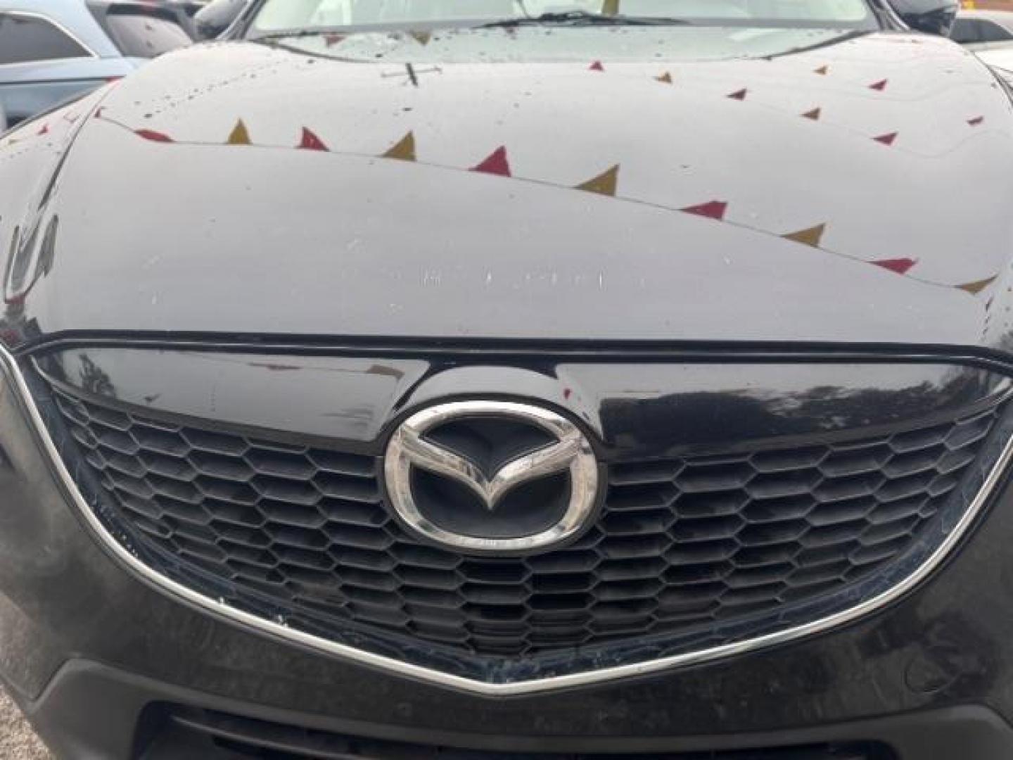 2015 Black Mazda CX-5 Grand Touring AWD (JM3KE4DY3F0) with an 2.5L L4 DOHC 16V engine, 6-Speed Automatic transmission, located at 1806 Veterans Memorial Hwy SW, Austell, GA, 30168, (770) 944-9558, 33.817959, -84.606987 - Photo#18