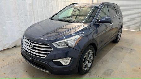 2016 Blue Hyundai Santa Fe SE AWD (KM8SMDHF4GU) with an 3.3L V6 DOHC 24V engine, 6-Speed Automatic transmission, located at 1806 Veterans Memorial Hwy SW, Austell, GA, 30168, (770) 944-9558, 33.817959, -84.606987 - Photo#0