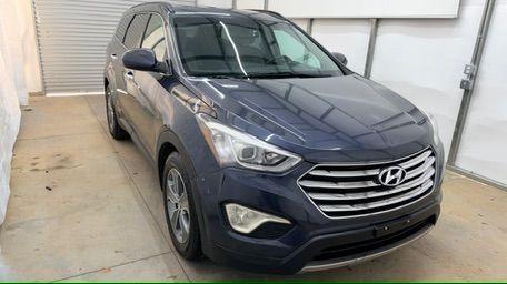 2016 Blue Hyundai Santa Fe SE AWD (KM8SMDHF4GU) with an 3.3L V6 DOHC 24V engine, 6-Speed Automatic transmission, located at 1806 Veterans Memorial Hwy SW, Austell, GA, 30168, (770) 944-9558, 33.817959, -84.606987 - Photo#8