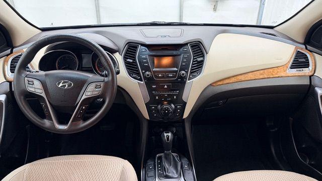 2016 Blue Hyundai Santa Fe SE AWD (KM8SMDHF4GU) with an 3.3L V6 DOHC 24V engine, 6-Speed Automatic transmission, located at 1806 Veterans Memorial Hwy SW, Austell, GA, 30168, (770) 944-9558, 33.817959, -84.606987 - Photo#15