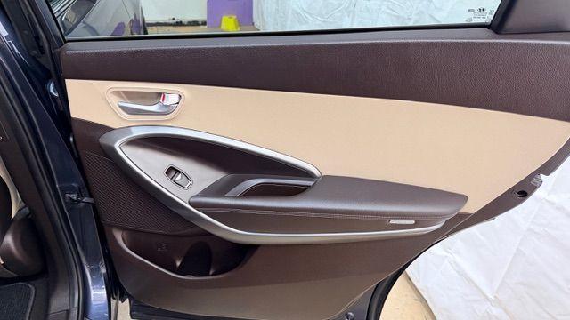 2016 Blue Hyundai Santa Fe SE AWD (KM8SMDHF4GU) with an 3.3L V6 DOHC 24V engine, 6-Speed Automatic transmission, located at 1806 Veterans Memorial Hwy SW, Austell, GA, 30168, (770) 944-9558, 33.817959, -84.606987 - Photo#16