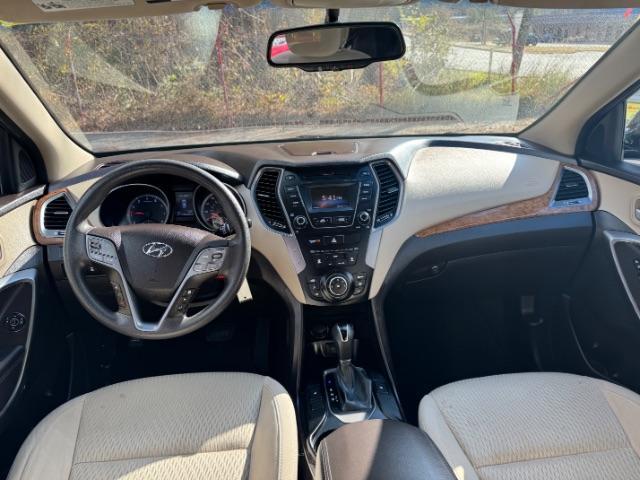 2016 Blue Hyundai Santa Fe SE AWD (KM8SMDHF4GU) with an 3.3L V6 DOHC 24V engine, 6-Speed Automatic transmission, located at 1806 Veterans Memorial Hwy SW, Austell, GA, 30168, (770) 944-9558, 33.817959, -84.606987 - Photo#10