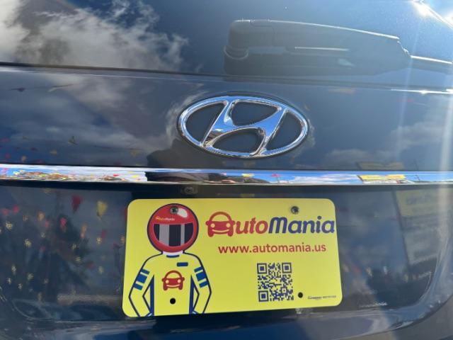 2016 Blue Hyundai Santa Fe SE AWD (KM8SMDHF4GU) with an 3.3L V6 DOHC 24V engine, 6-Speed Automatic transmission, located at 1806 Veterans Memorial Hwy SW, Austell, GA, 30168, (770) 944-9558, 33.817959, -84.606987 - Photo#13